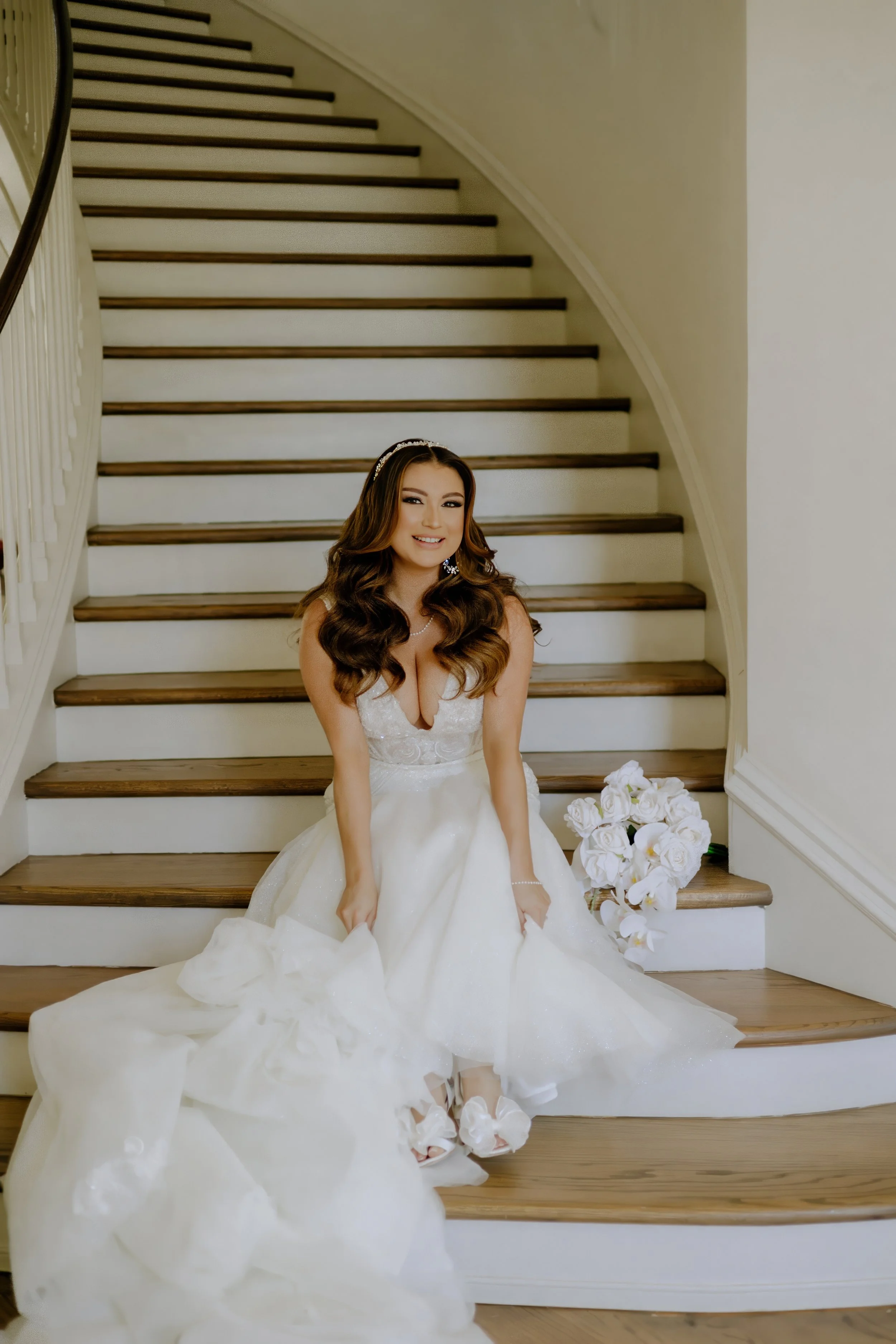 Houston & Texas Family, Couples, Newborn, Maternity, Bridal Photography – Bride lifting veil, sunlight catching details, Houston luxury space.