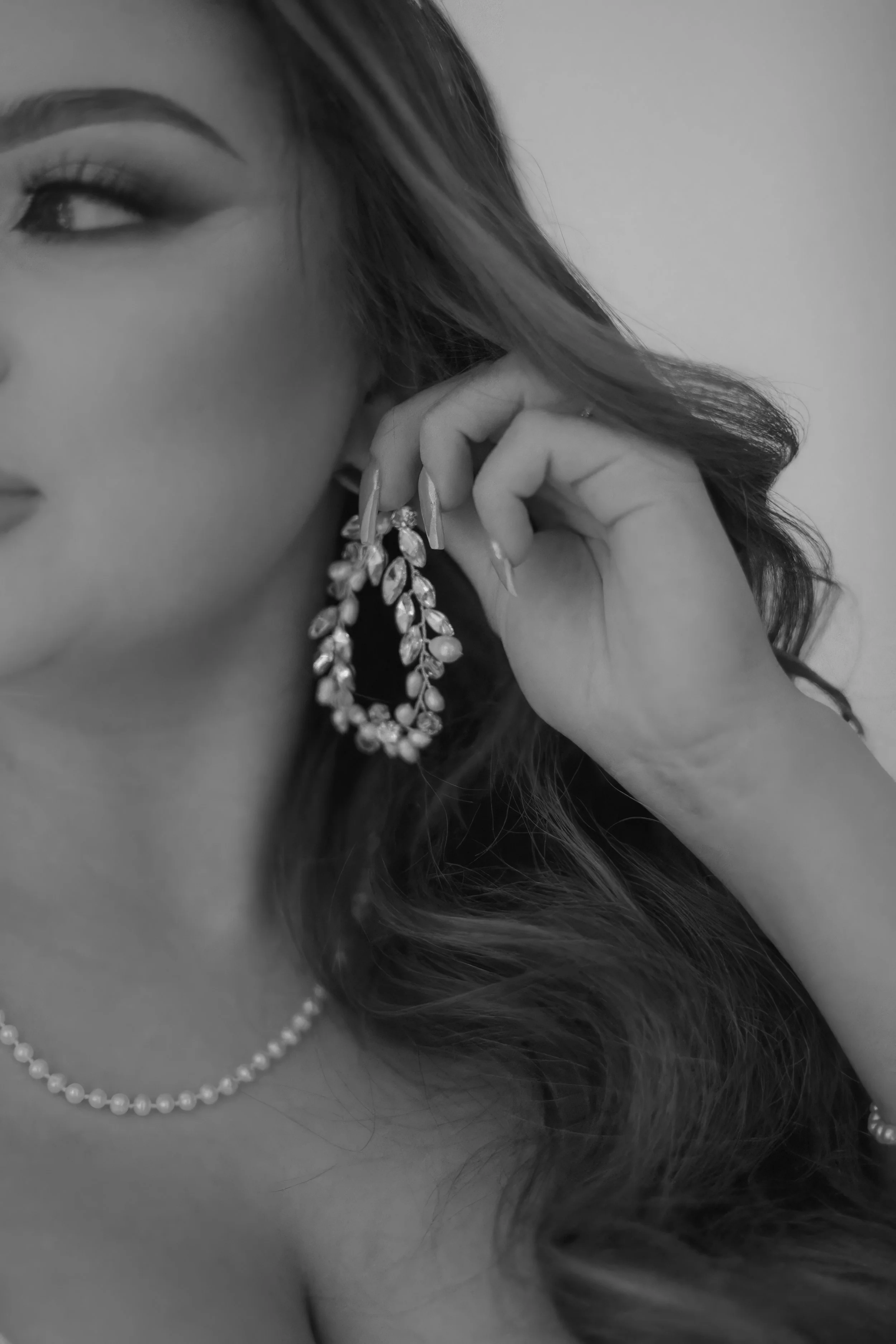 Houston & Texas Family, Couples, Newborn, Maternity, Bridal Photography – Black-and-white close-up of bride’s pearl earrings, Houston studio.
