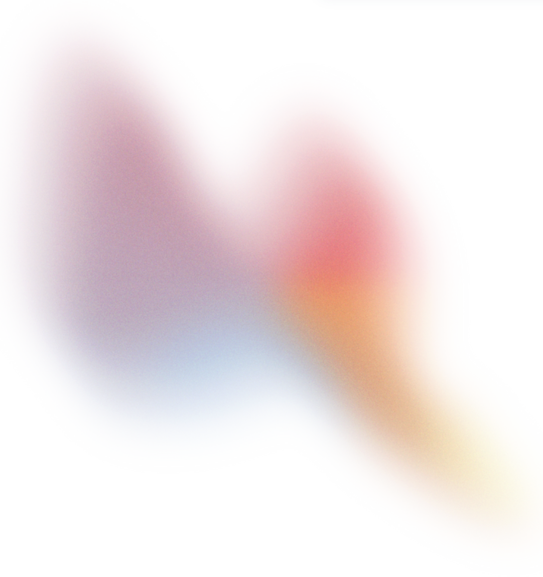 Blurred abstract image with shades of pink, purple, blue, and yellow.