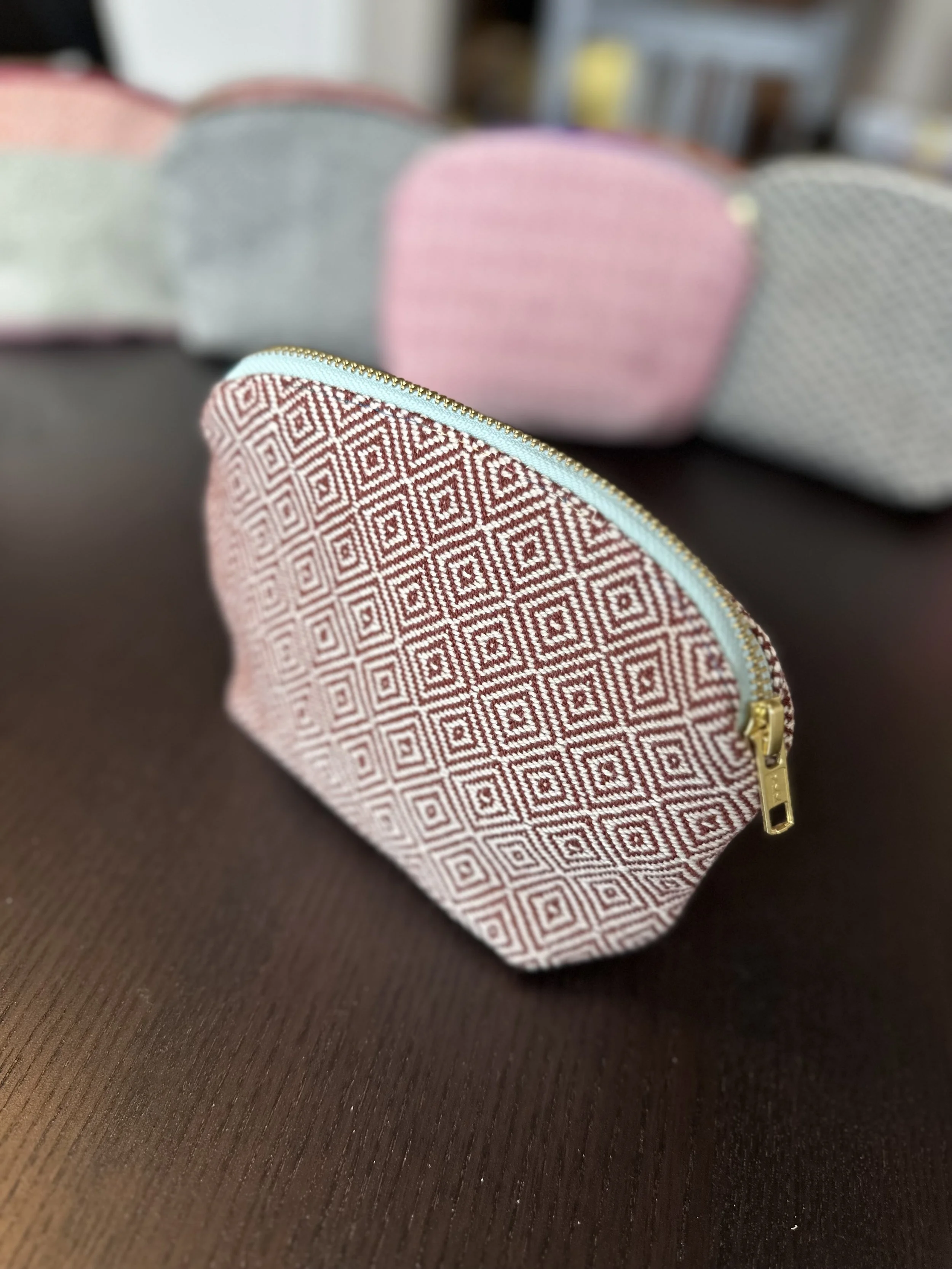 zipper pouch brown with blue zipper
