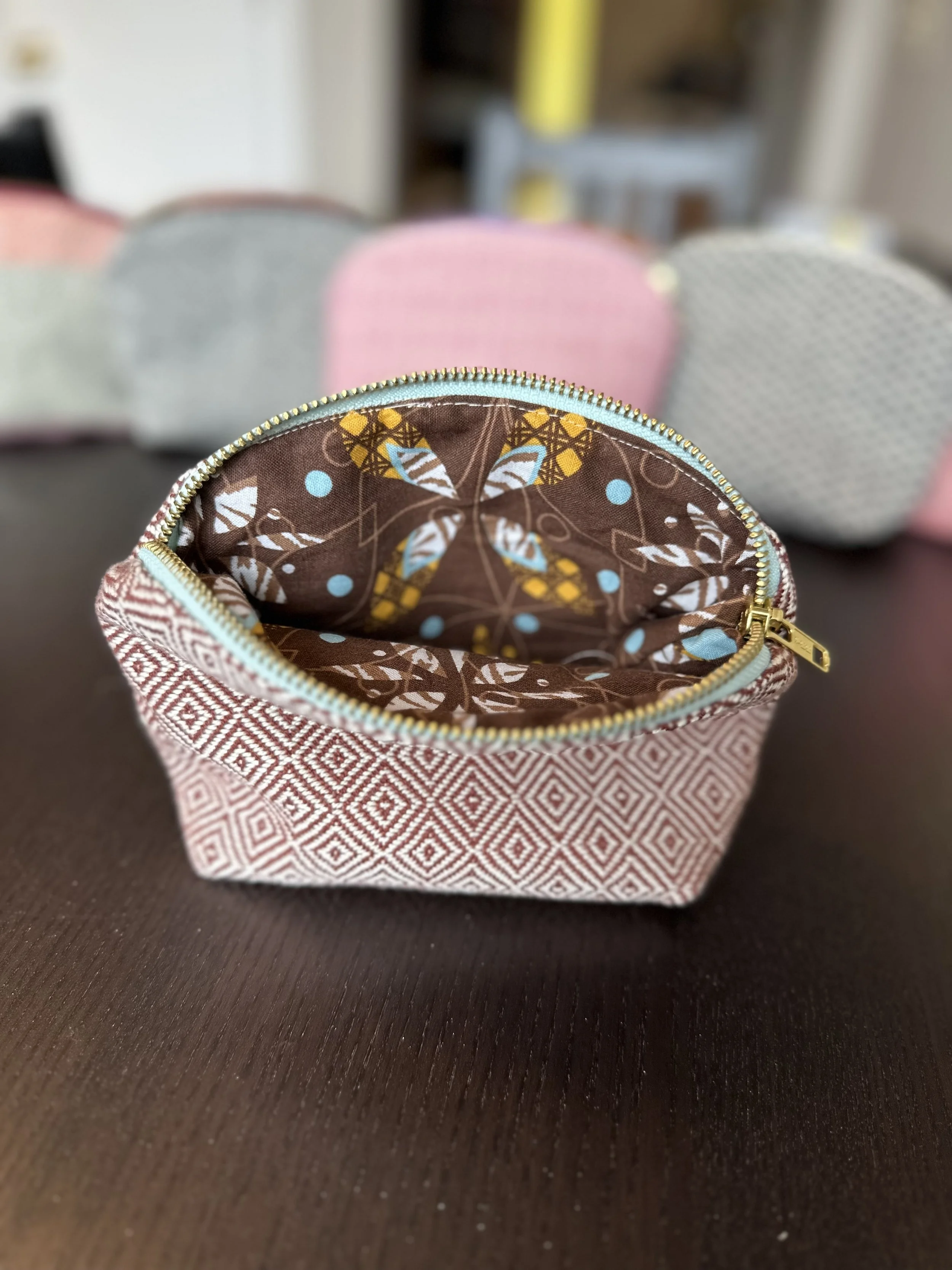 zipper pouch brown with blue zipper