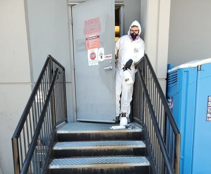 BC Trauma Cleaning technician on-site at a commercial facility for decontamination.