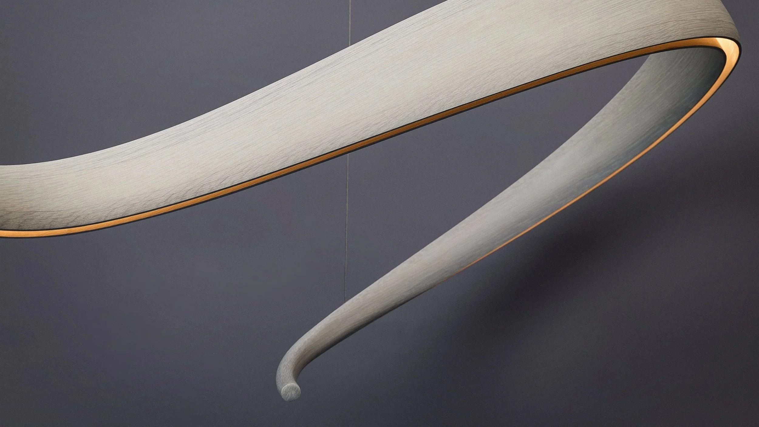 Ceiling-hung illuminated form by Adam Bentz.