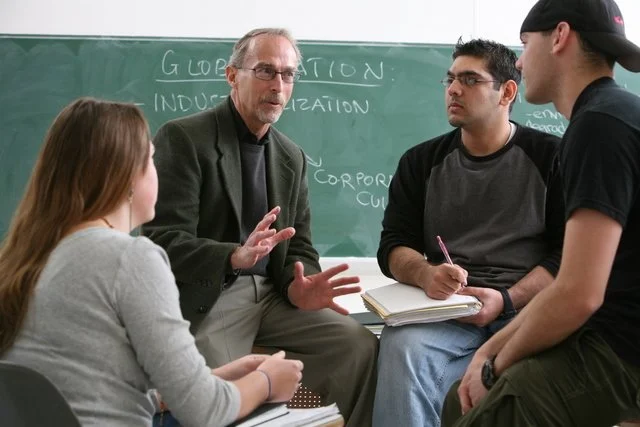 Distinguished-Professor-Armstrong-teaching-students.jpg