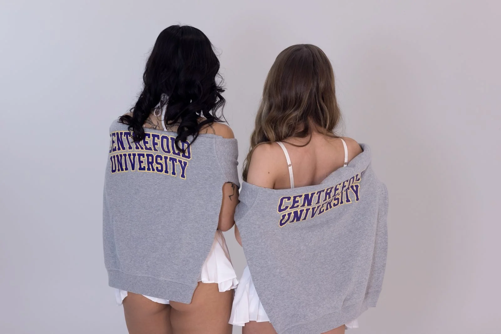 Centrefold Lounge crew wearing purple CFL jumpers