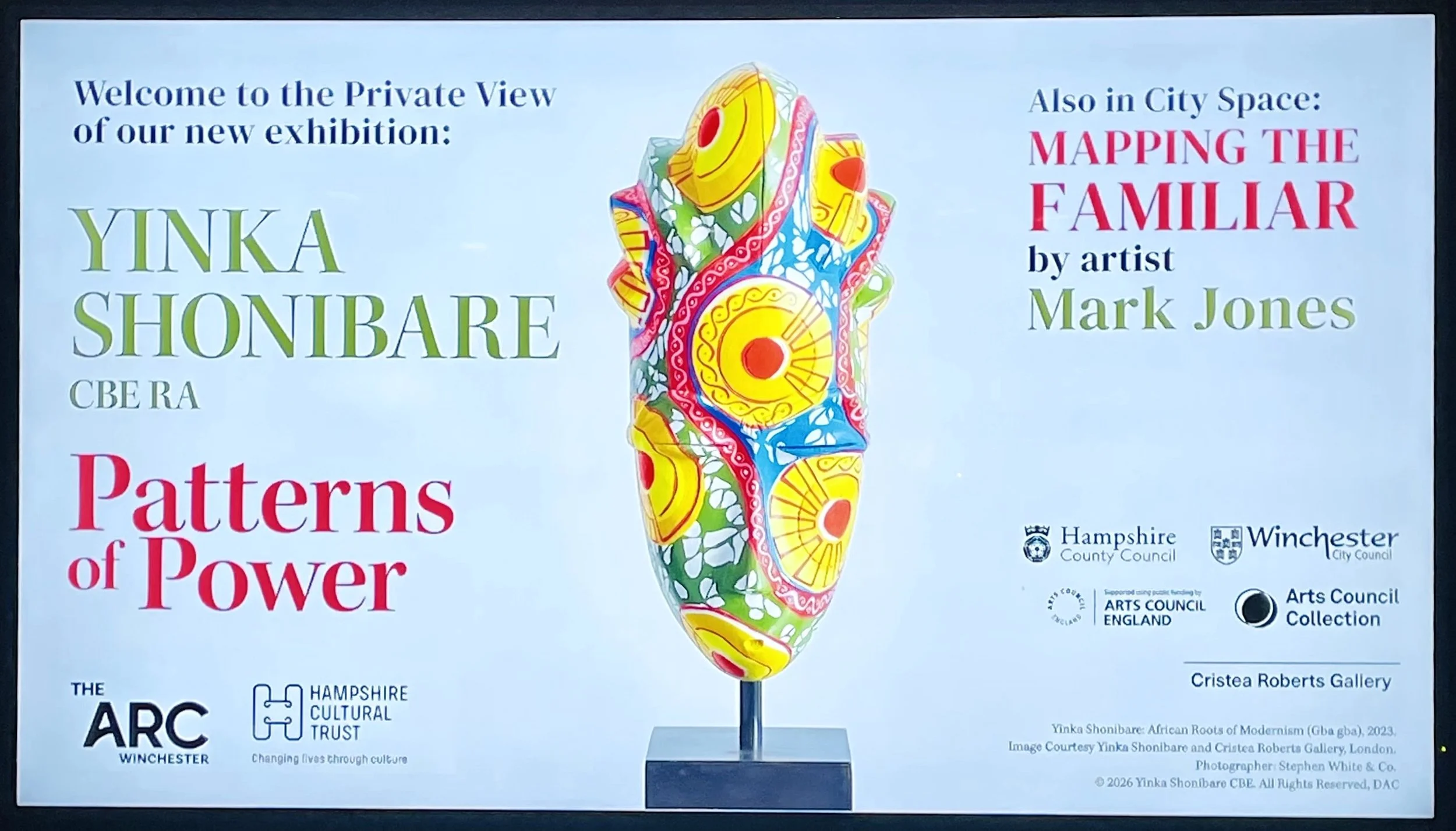Welcome screen for a private view showing Yinka Shonibare Patterns of Power sculpture and mentioning Mark Jones Mapping the Familiar