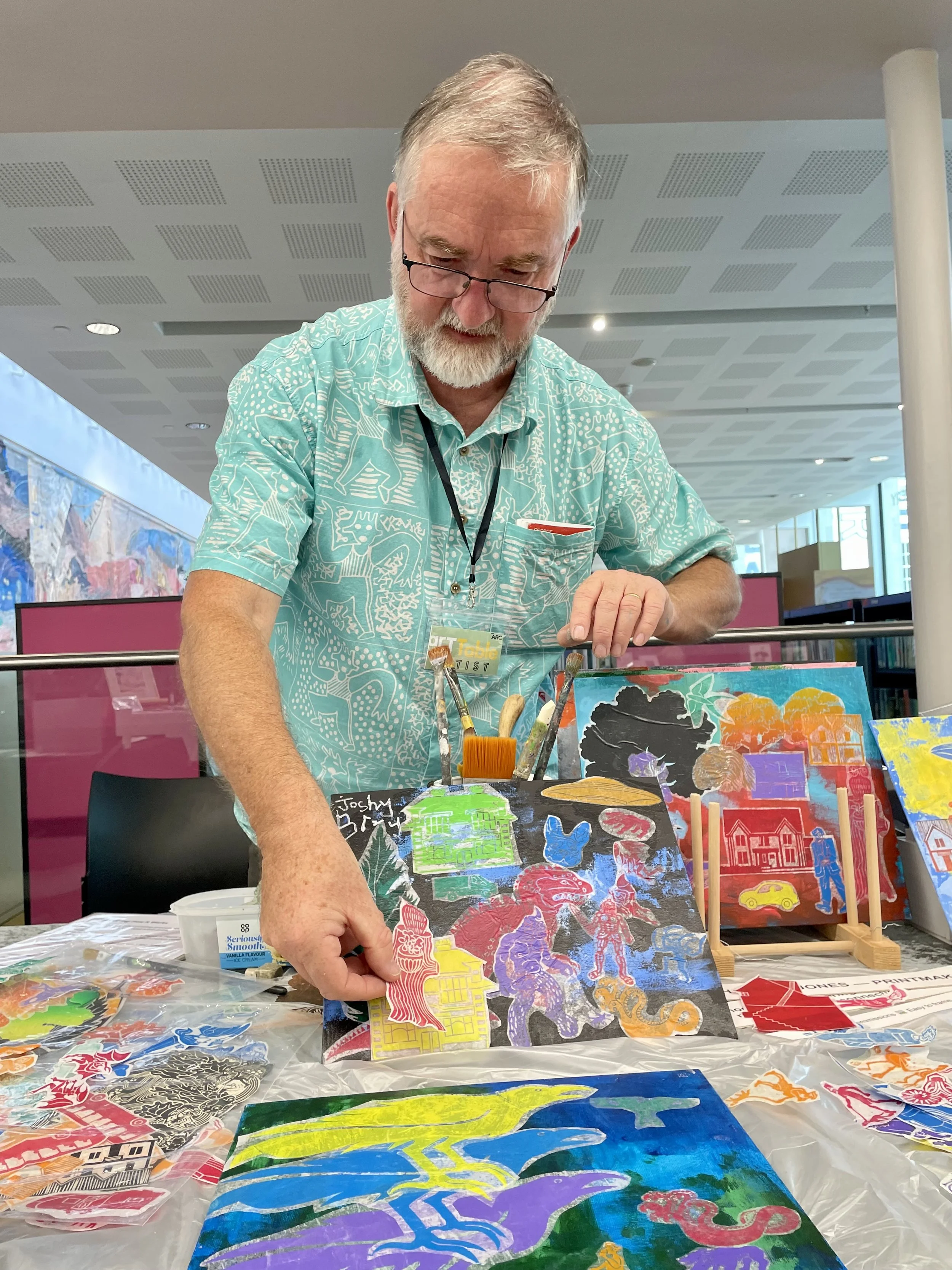 Mark showing collage production technique at arTTable the Arc Winchester