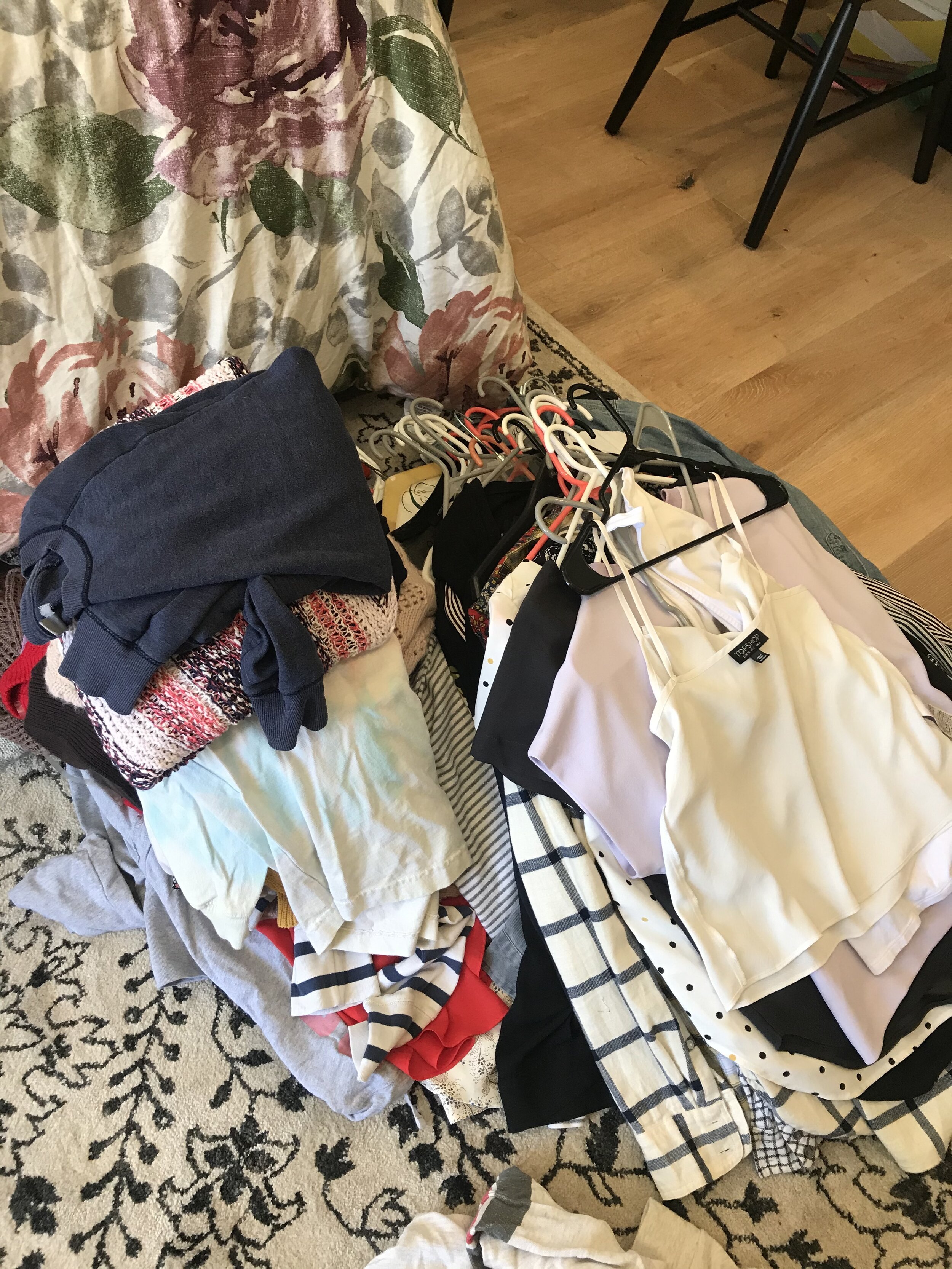 Clothing pile to sort, declutter, and organizer.jpeg