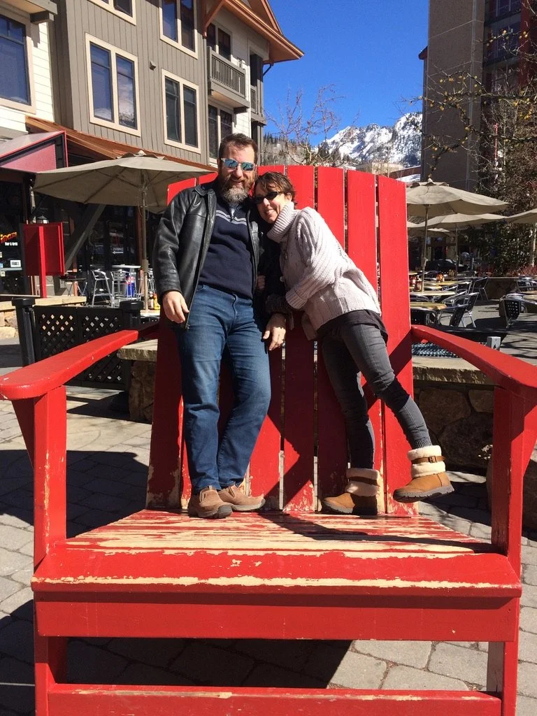 in a big red chair.jpeg