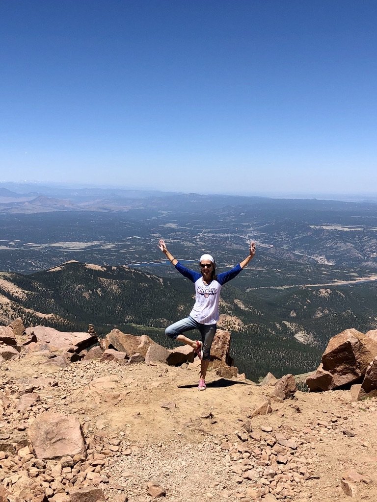 yoga pose on a mountain.jpeg