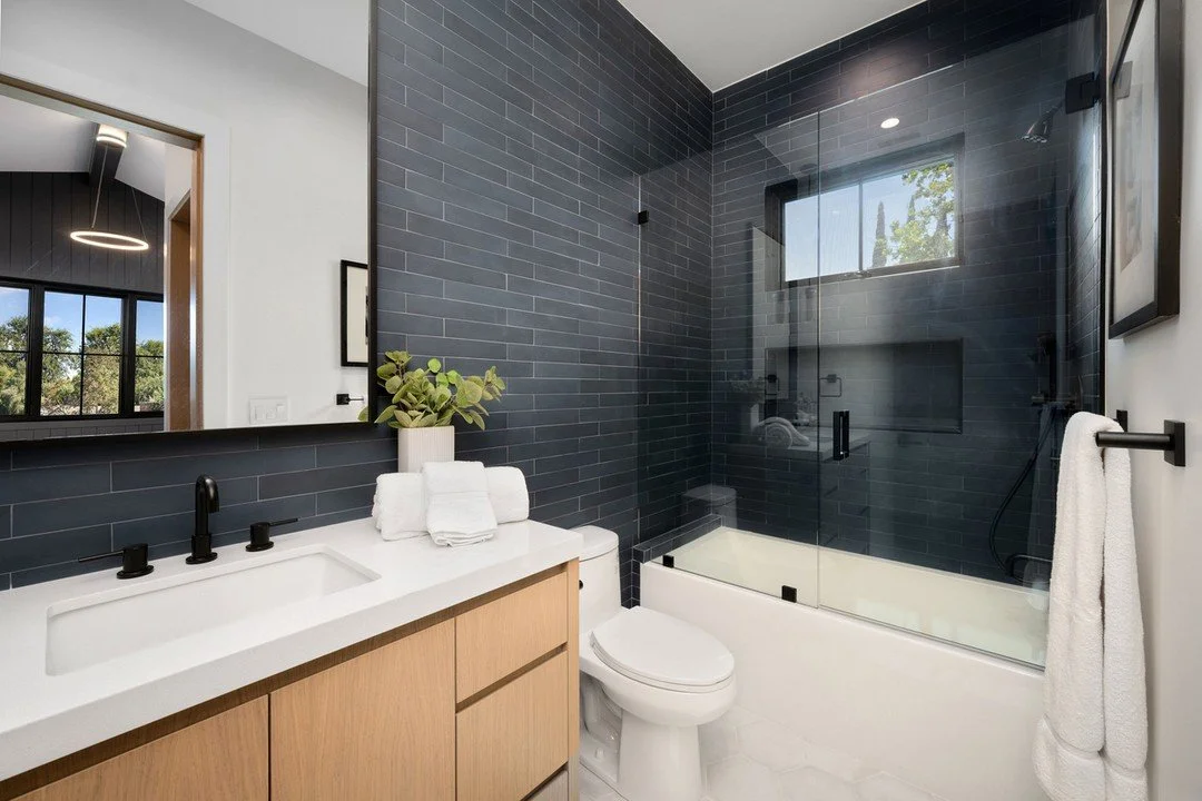 Is your bathroom in need of a refresh? 🛁 At Out of the Woods Construction &amp; Cabinetry, Inc., we specialize in bathroom remodeling. We're committed to providing you with a stress-free remodeling experience, with organized planning and open commun