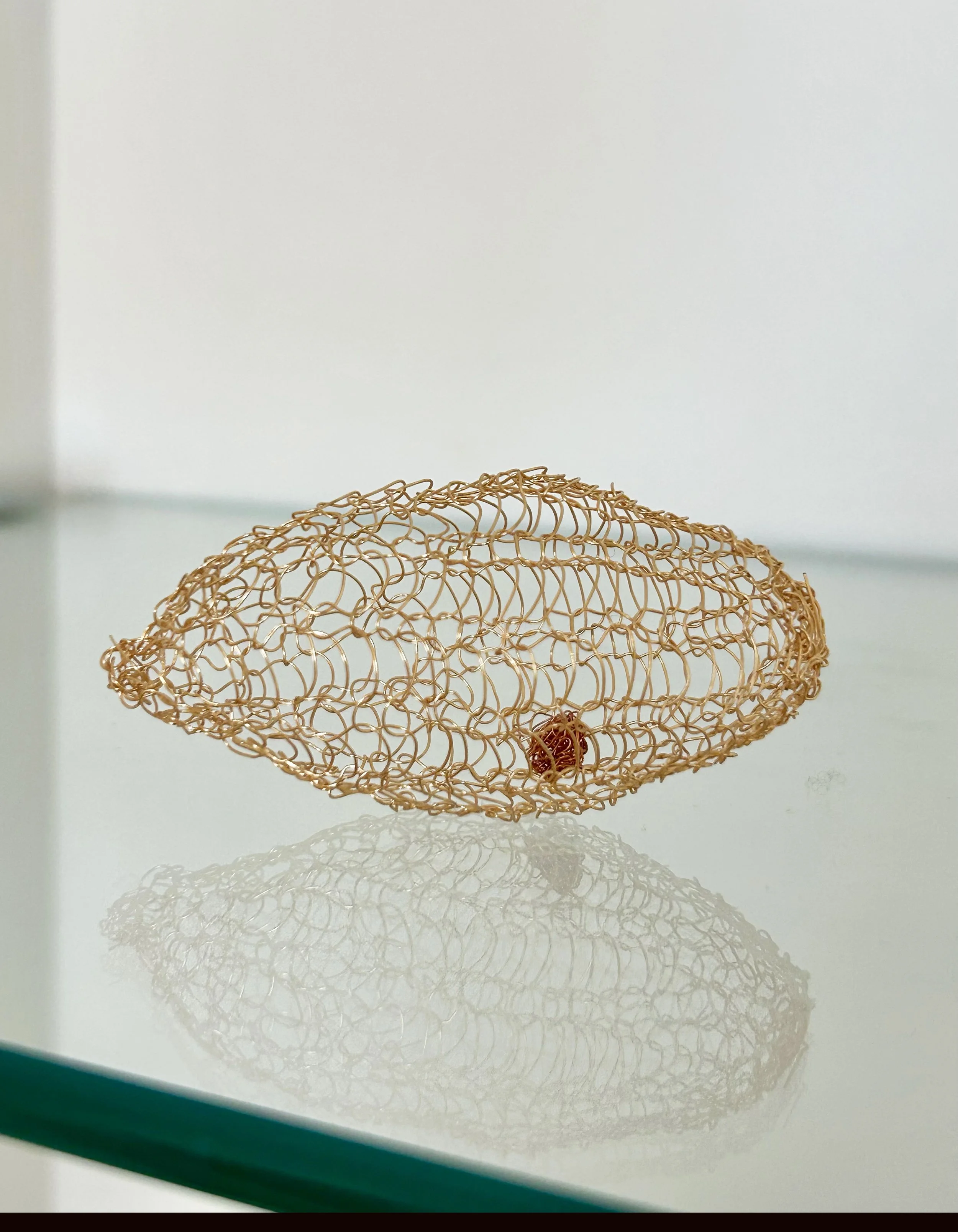 Uterus – crochet copper wire. 4x7x4 cm. 2025                                                                   