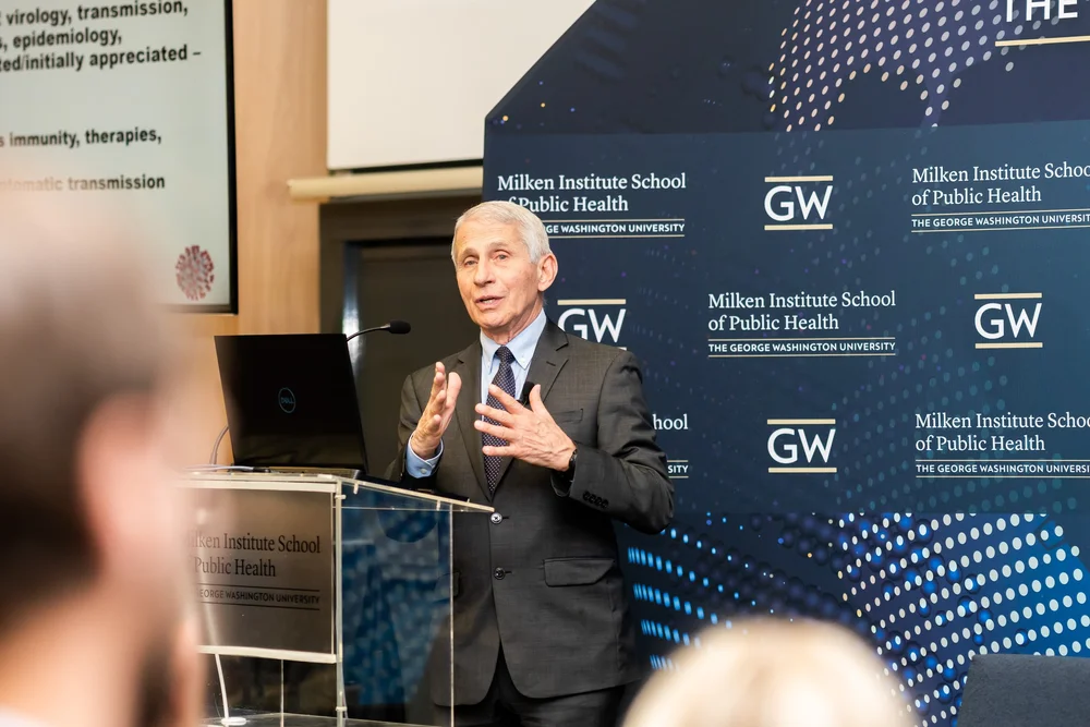 Speaker addressing the crowd at a George Washington University event