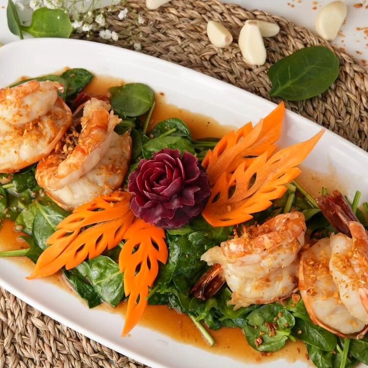 What did the Garlic Jumbo Prawn 🍤 say to the chef? 

Lay me down in a bed of spinach... drizzle me with garlic sauce, and enjoy me with a side of Jasmine rice.

DISCLAIMER: Food decor is for advertising purposes only. Dishes may not appear exactly a