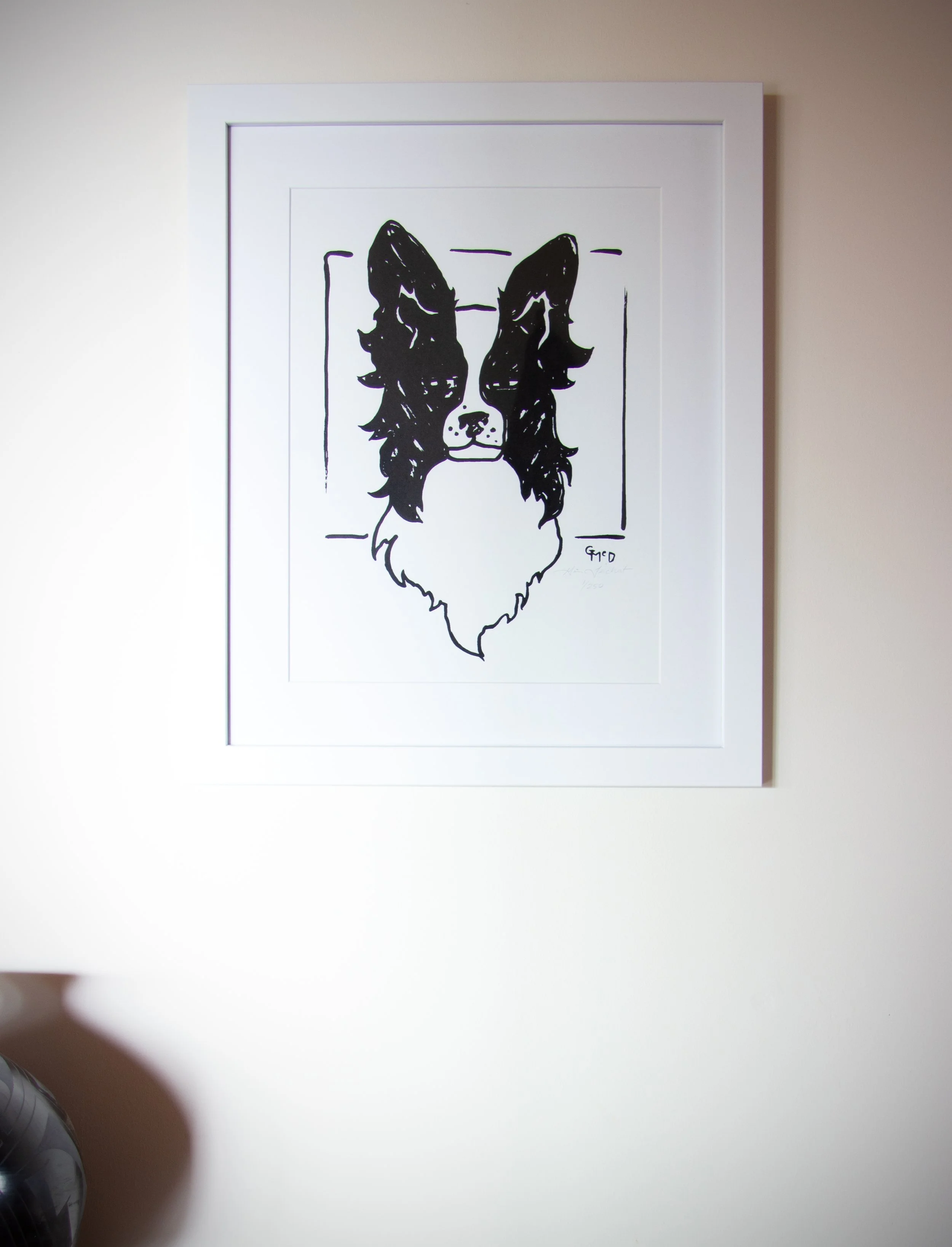 Screenprint of a black and white border collie in a white frame