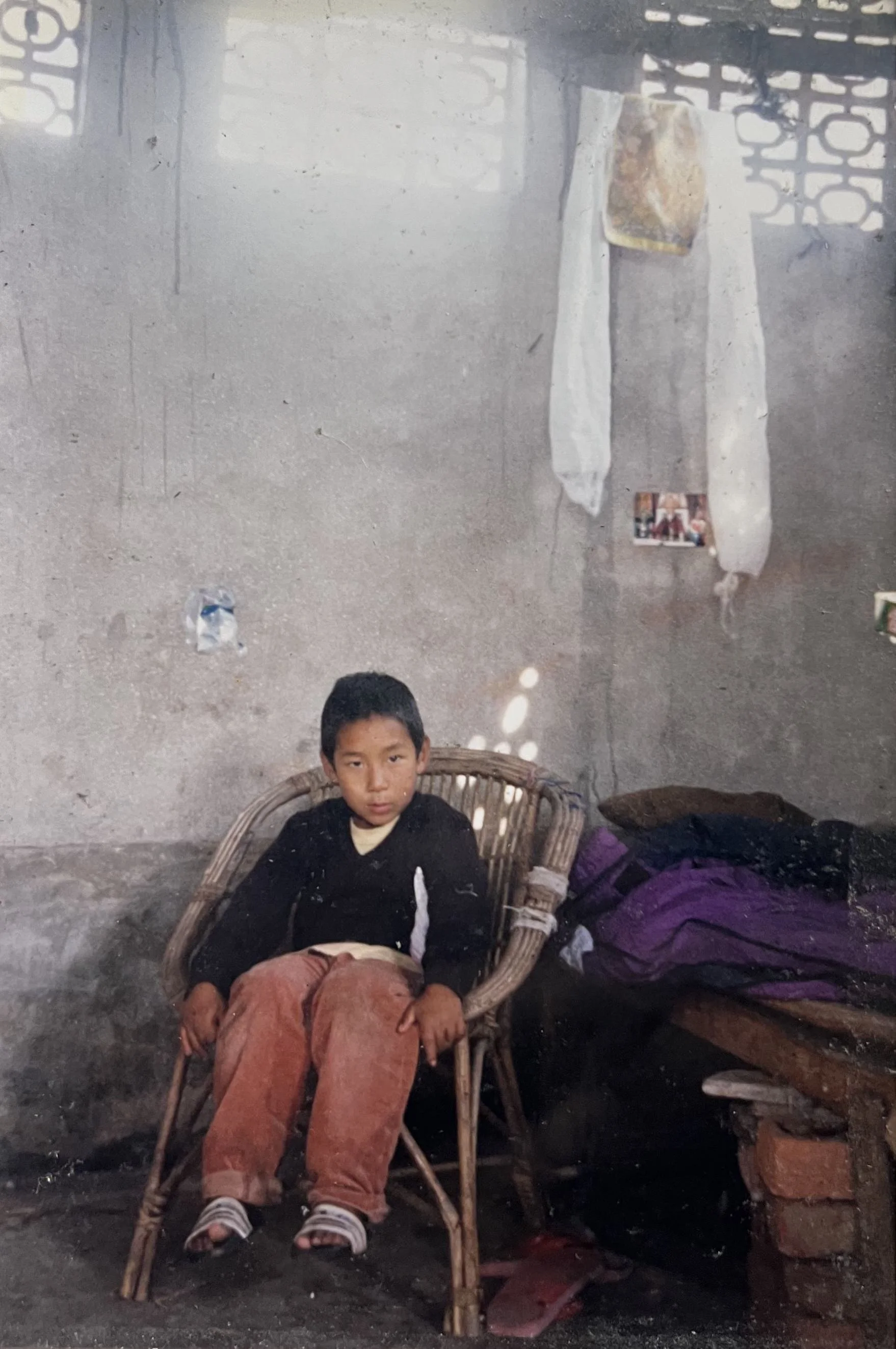 Tulku Dawa Dorje visiting N. L. Drolma in her retreat room, Chatral Rinpoche's gompa, Salbari, India (1998)