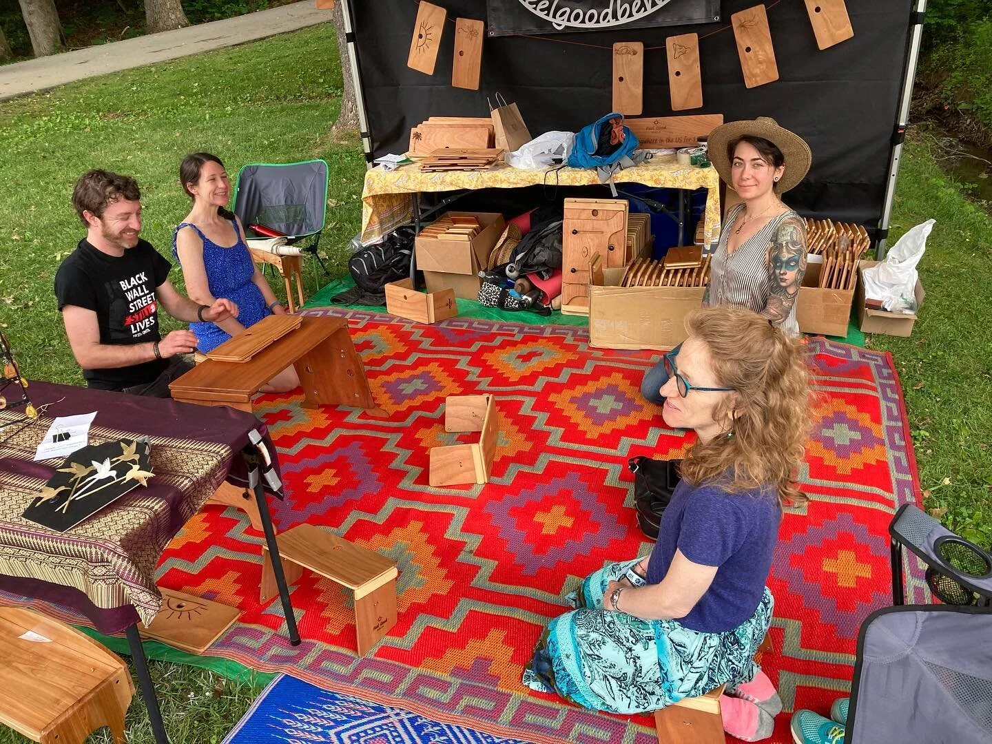 Trying out benches at the LEAF GLOBAL ARTS SPRING FESTIVAL  in Black Mountain