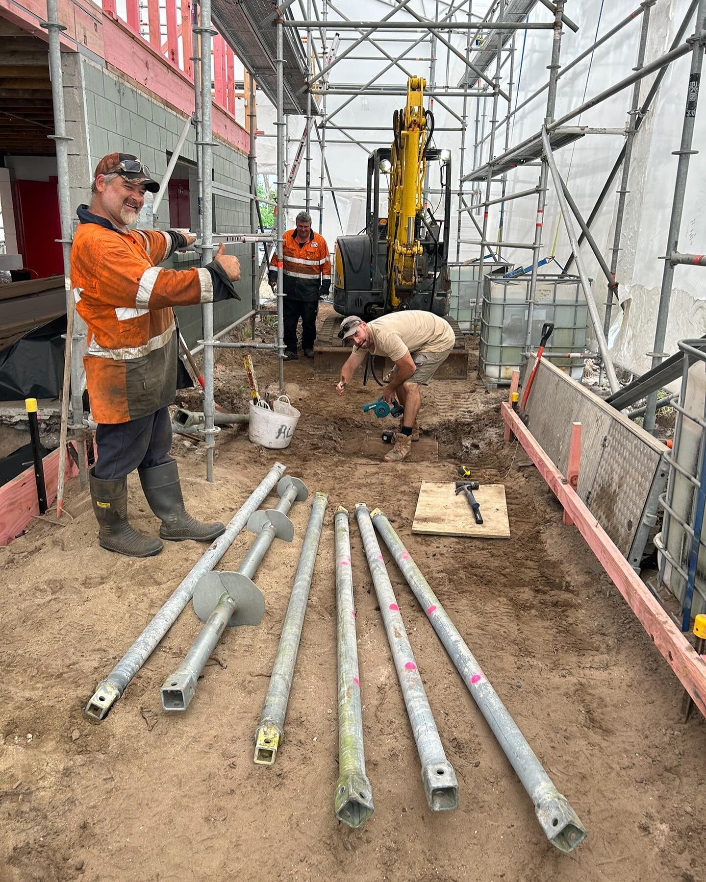 A new engineering solution experience for us on one of our Waihi Beach renovations, this is the last one to go in this morning of the 25, 13m deep galvanised steel, screw anchor piles, that go through the defective soil layers, down into solid ground