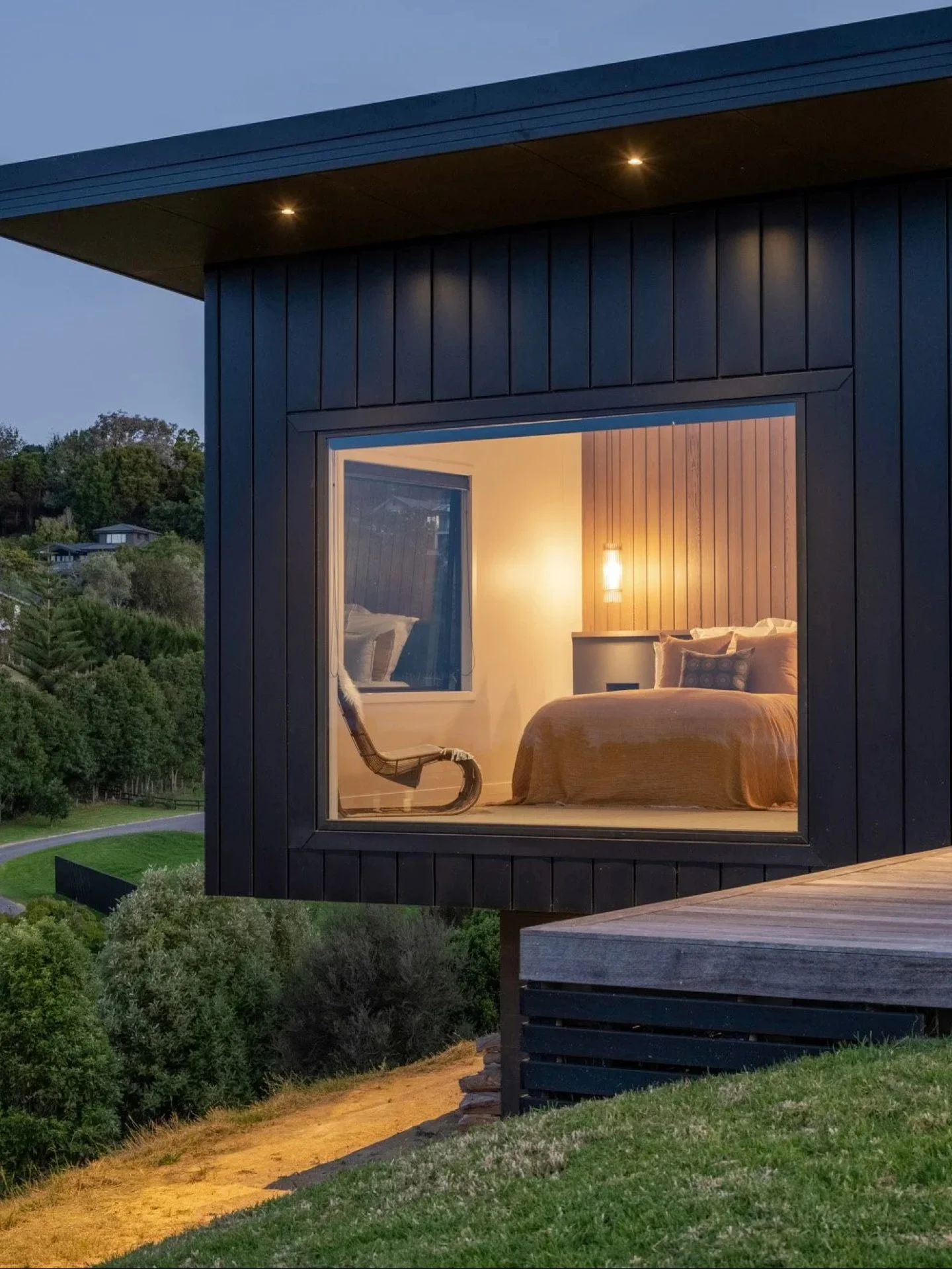 Design inspiration from our Minden Hill build, Tauranga.

A kitchen and dining space designed around the view &mdash; where the landscape becomes part of the interior. A splashback window that frames the outdoors, full-width glazing that floods the s