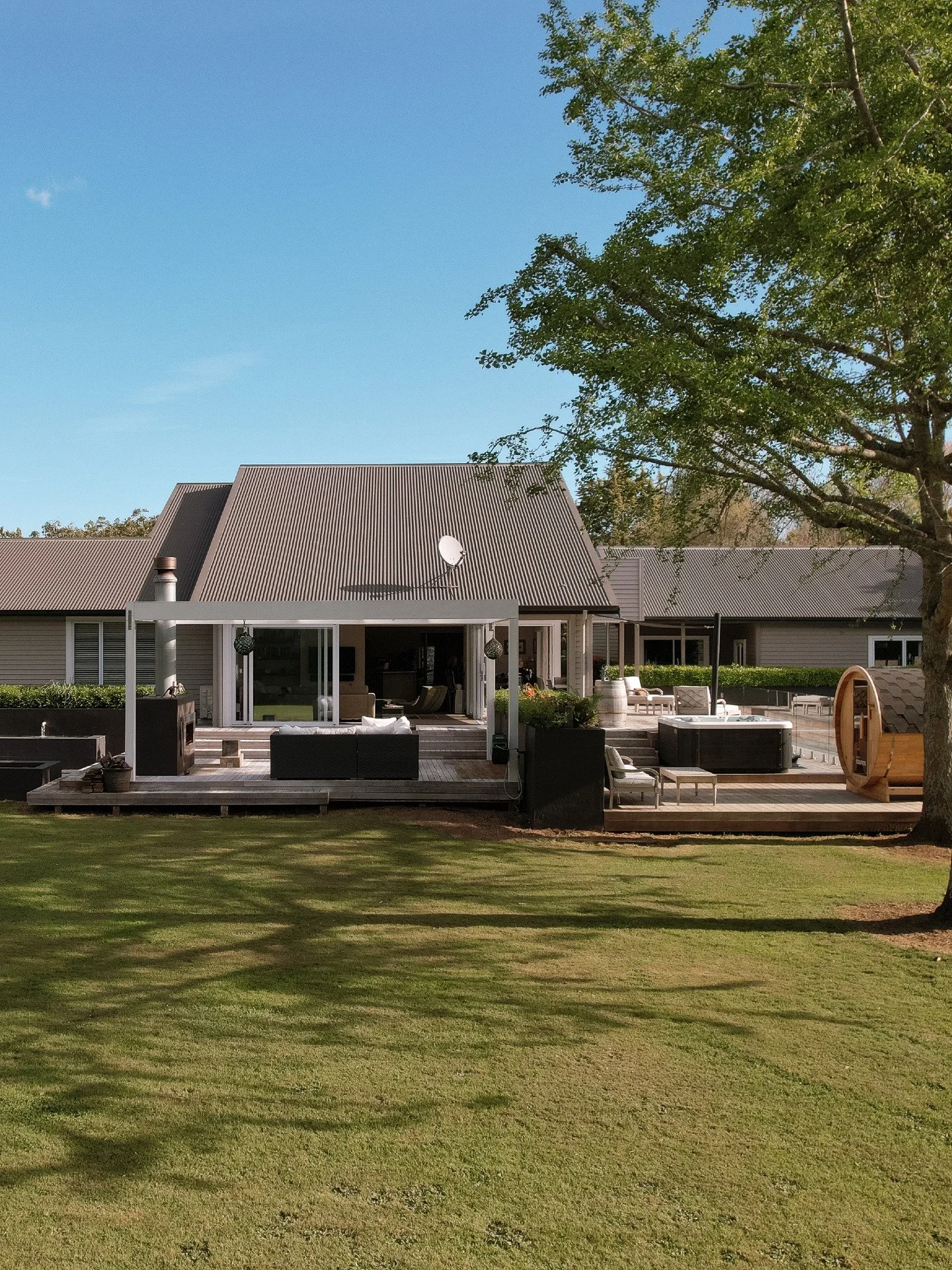 Sometimes a renovation isn't about adding more - it's about opening up what's already there.

At Gill Lane in Te Puna, the focus was the living and entertaining end of the home. A steel box frame and connecting beam made way for large sliding and sta