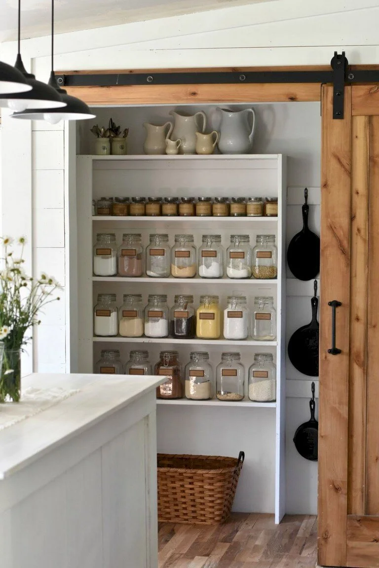 Salt Spring Island farmhouse pantry neatly organized with jars