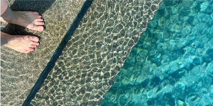 woman-standing-on-step-in-pool.jpg