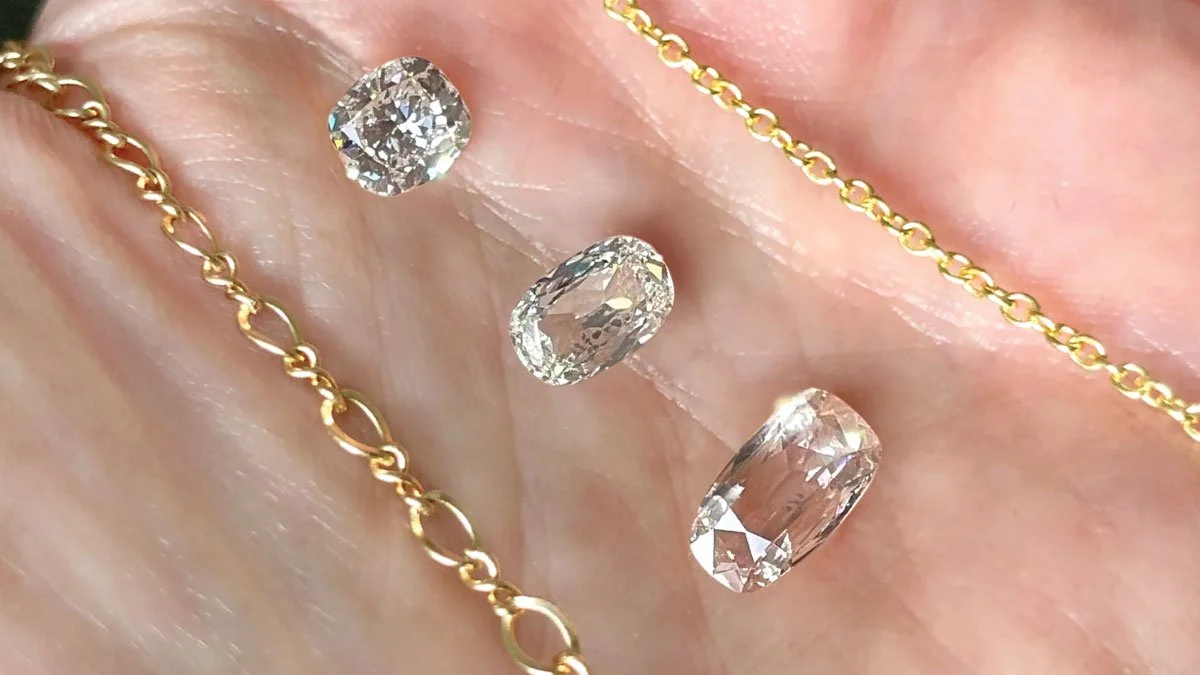 three-antique-diamonds-with-chains-on-hand.jpg