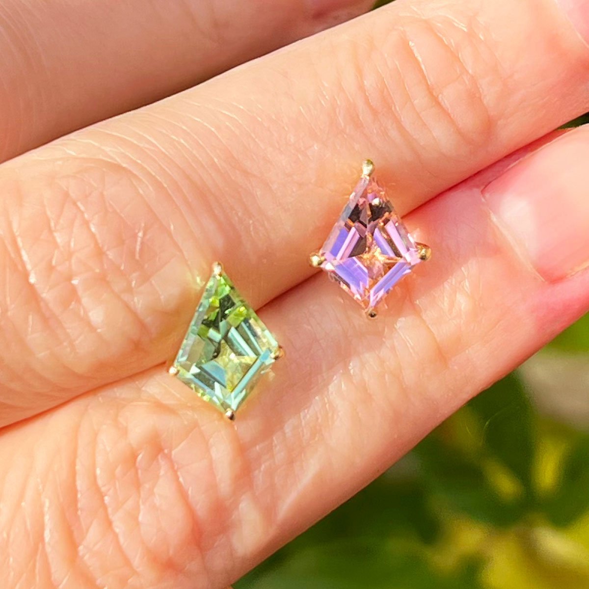 Mismatched Earrings on woman's hand - Expensive Gifts for Women