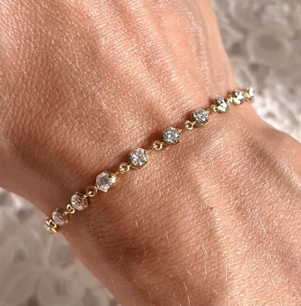 Diamond tennis bracelet on a woman's wrist