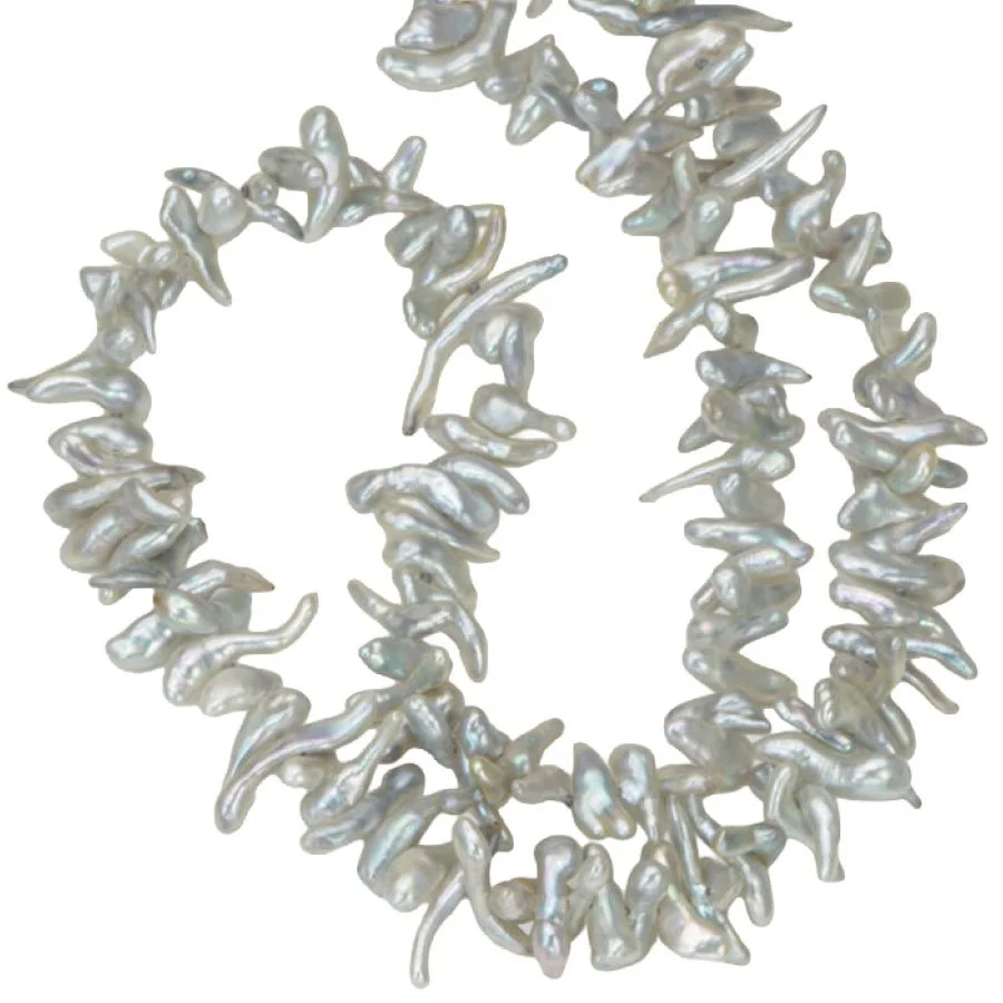 akoya_statement_necklace_yellow_gold.jpg