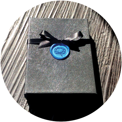 Luxury jewelry anniversary gift card in black box and unwrapped