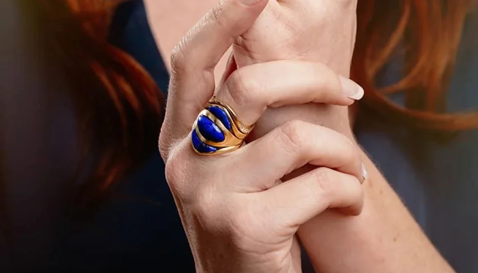 lapis lazuli statement ring in Fairmined gold on woman's finger