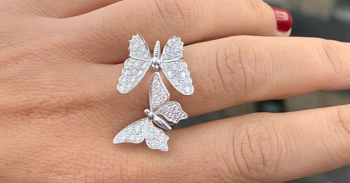 diamond-butterfly-ring-18k-white-gold-on-womans-hand.jpg