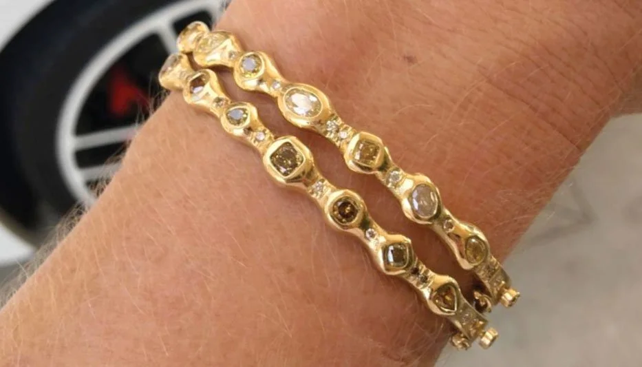 colored diamond hinged bangle bracelet stack on arm