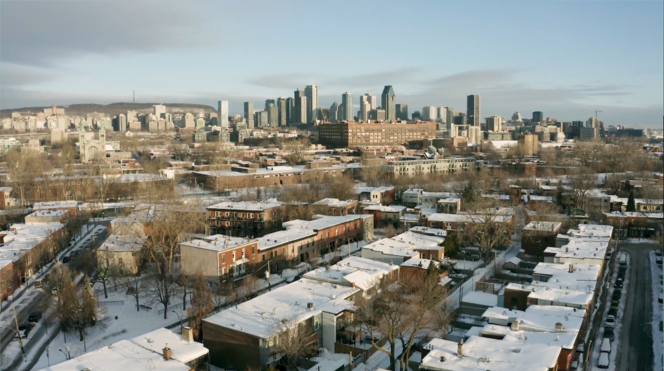Aerial drone shot of Quebec skyline:
Expands scope of story beyond individual business to establish geographic and operational context. Sets up frames for the interviewee's geographical location.