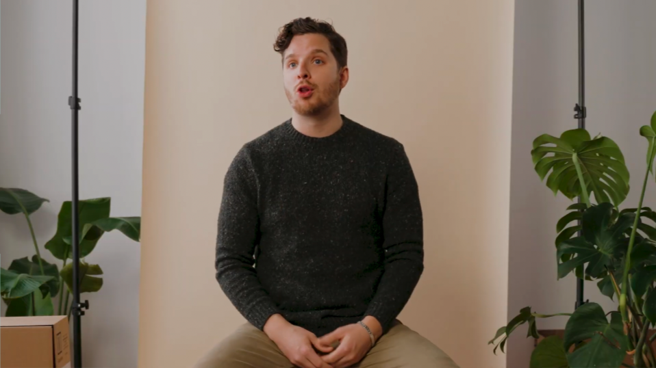Return to interview frame:
Re-establishes the primary narrator as voice anchor while maintaining continuity of testimony over B-roll and UI sequences. This keeps the story grounded in lived experience while allowing visual expansion.