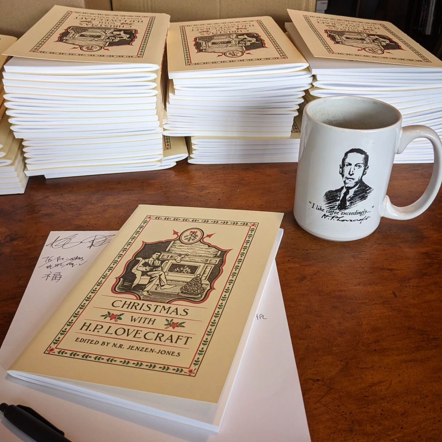 N.R. Jenzen-Jones is signing his &lsquo; &lsquo;Christmas with H.P. Lovecraft&rsquo; books at the H.P. Lovecraft Historical Society headquarters today. Congratulations to Nailah for being the first physical retail customer!