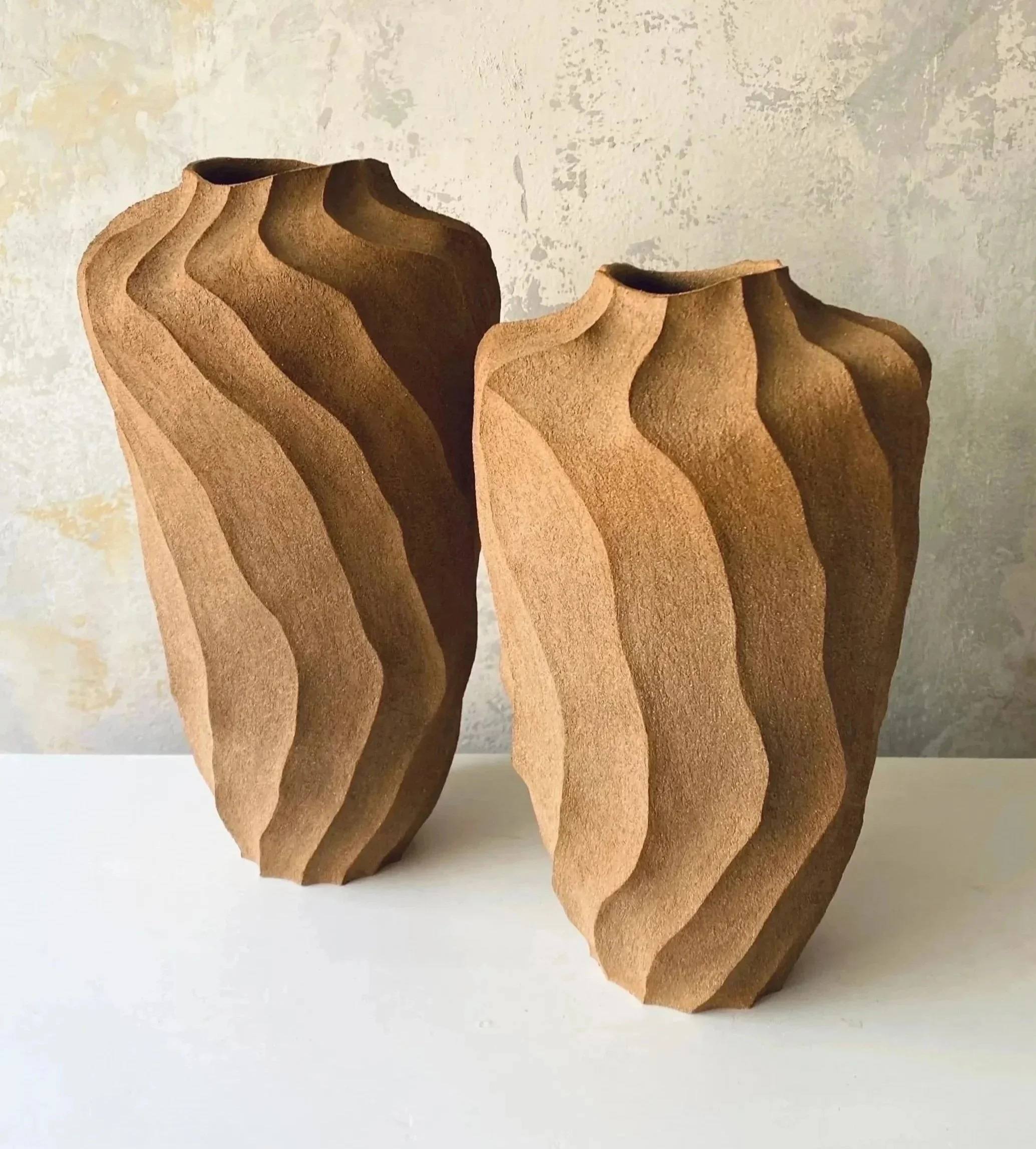 Hand built, finely worked stoneware vessels
H38cm and H42cm
