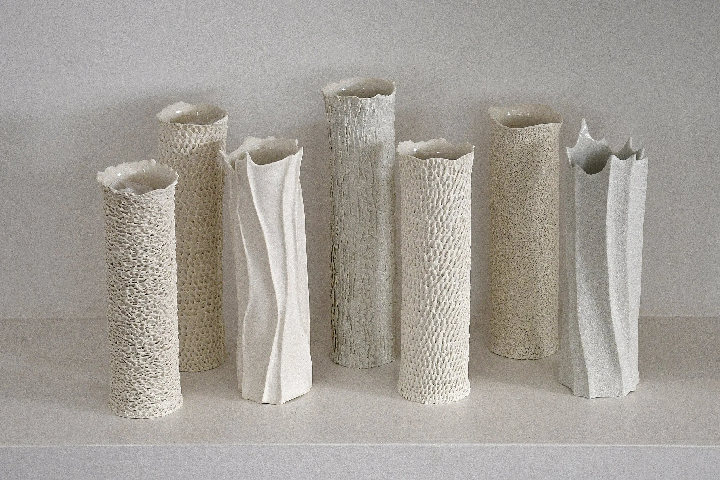 Porcelain fizz vessels - 
H 26-33 cm, dia 8cm approx