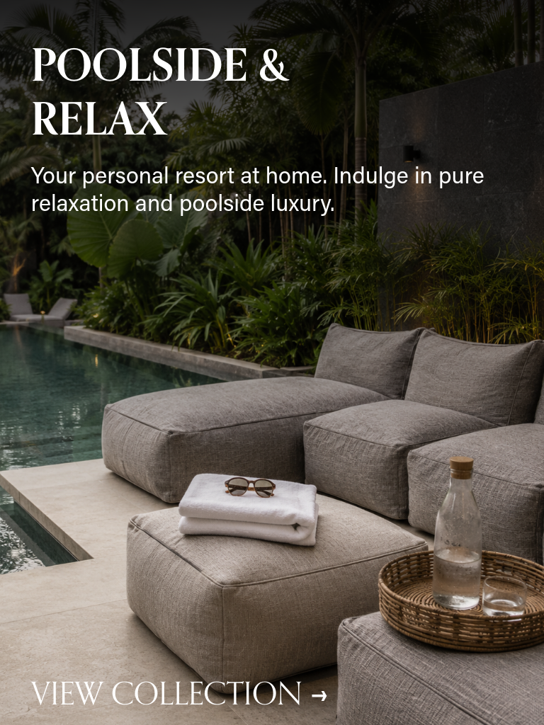 Luxury outdoor daybed with a dark wood canopy and premium sunlounger on a teak deck by an infinity pool, high-end resort style furniture Singapore.