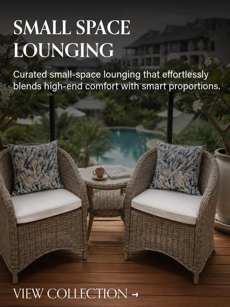 Sculpted wicker bistro chairs and small round coffee table on a luxury condo balcony overlooking a resort pool, compact outdoor furniture Singapore.