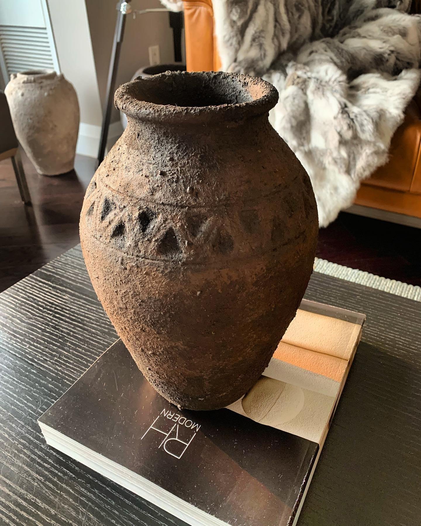 &ldquo;AVAILABLE&rdquo; - Embrace the allure of this remarkable handcrafted vessel, as it emanates a captivating primitive charm. With its earthy dark browns and organic warmth, this piece exudes a rustic appeal that transports you to a bygone era. 1