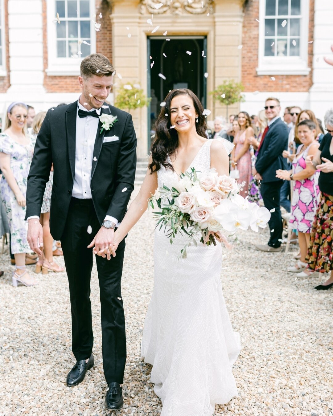 Looking back at Lauren &amp; Adam's romantic black tie wedding at @pyneshouse. A sunny outdoor ceremony, followed by drinks in the Rose Garden and their wedding breakfast in The Ballroom. 🖤

Can't wait to return here for spring &amp; summer weddings