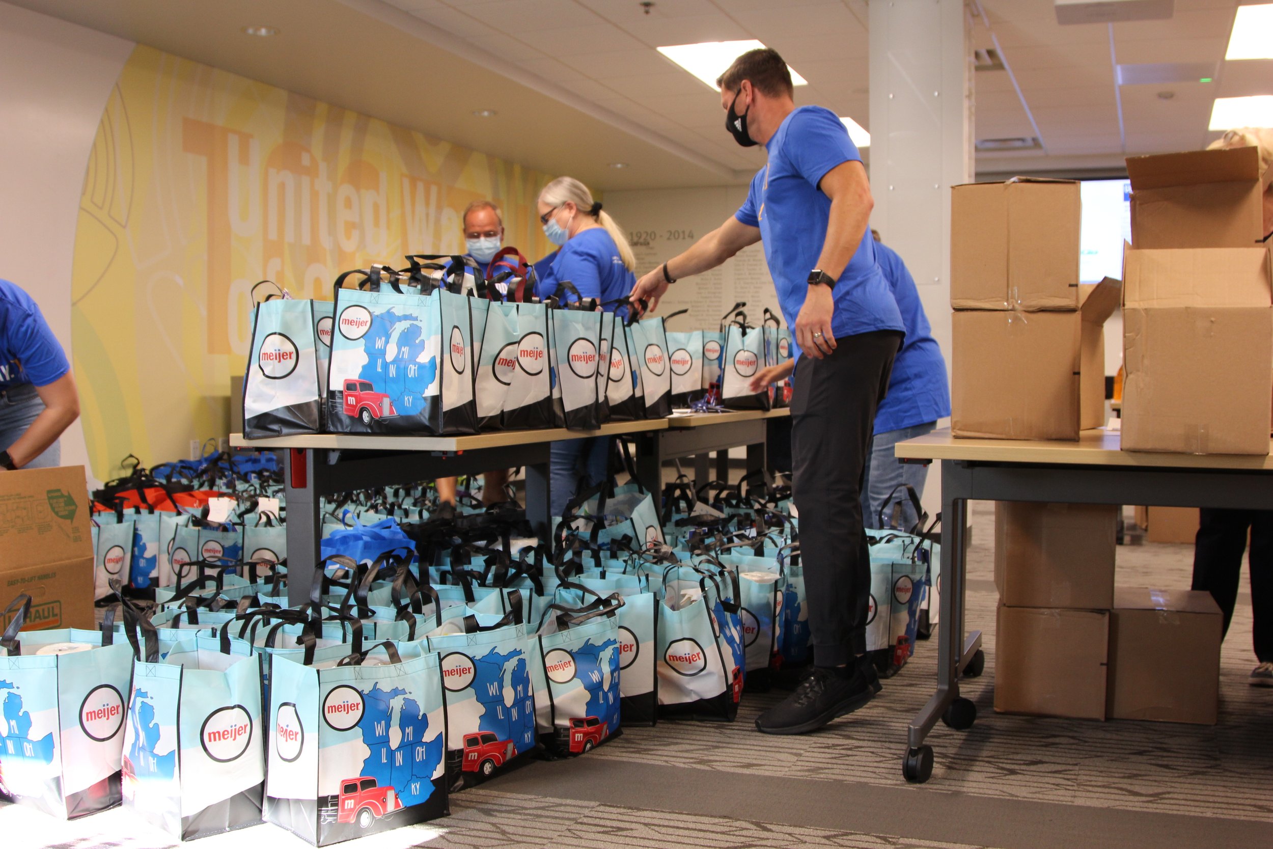  Volunteers assemble care kits for seniors on Go All IN Day Sept. 9, 2021,  at United Way of Central Indiana’s headquarters in Indianapolis.  