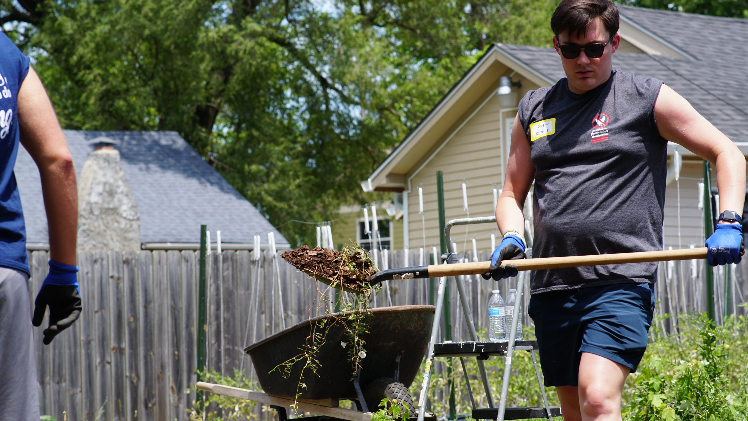  Volunteers shovel at Soul Food Project urban farm on June 24, 2022, for United Way of Central Indiana’s Go All IN Day. 