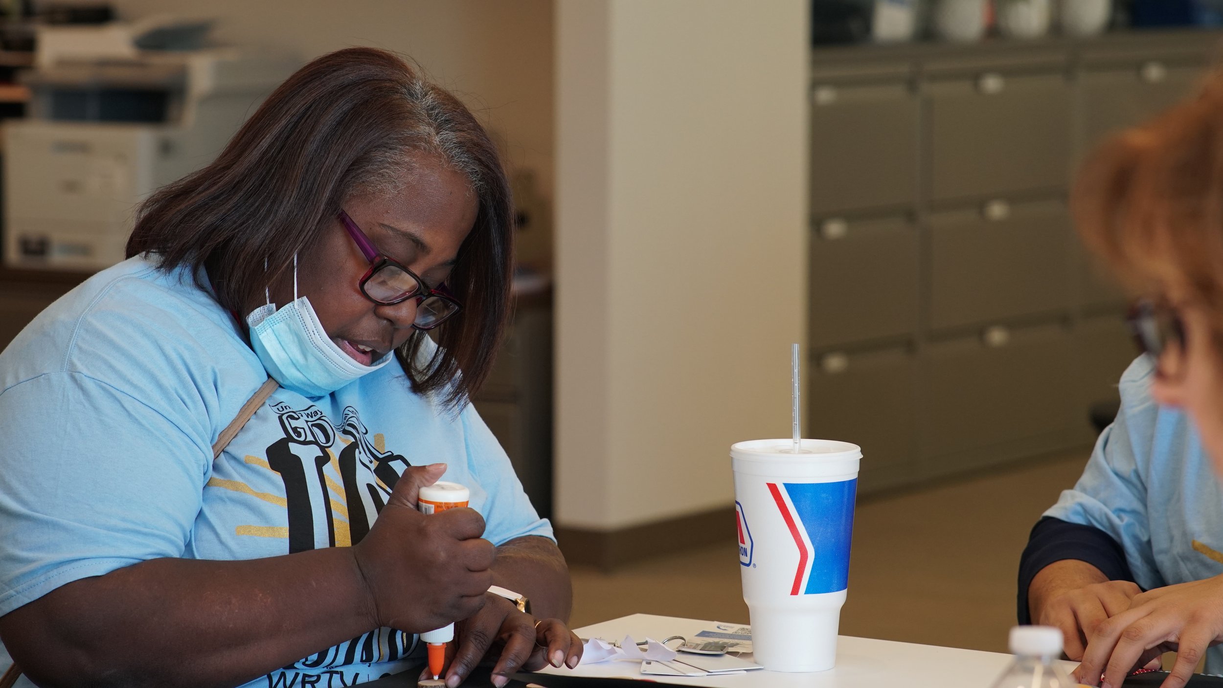  Volunteers build tactile books for children who are blind or visually impaired on June 24, 2022, at Visually Impaired Preschool Services as part of United Way of Central Indiana’s Go All IN Day.  