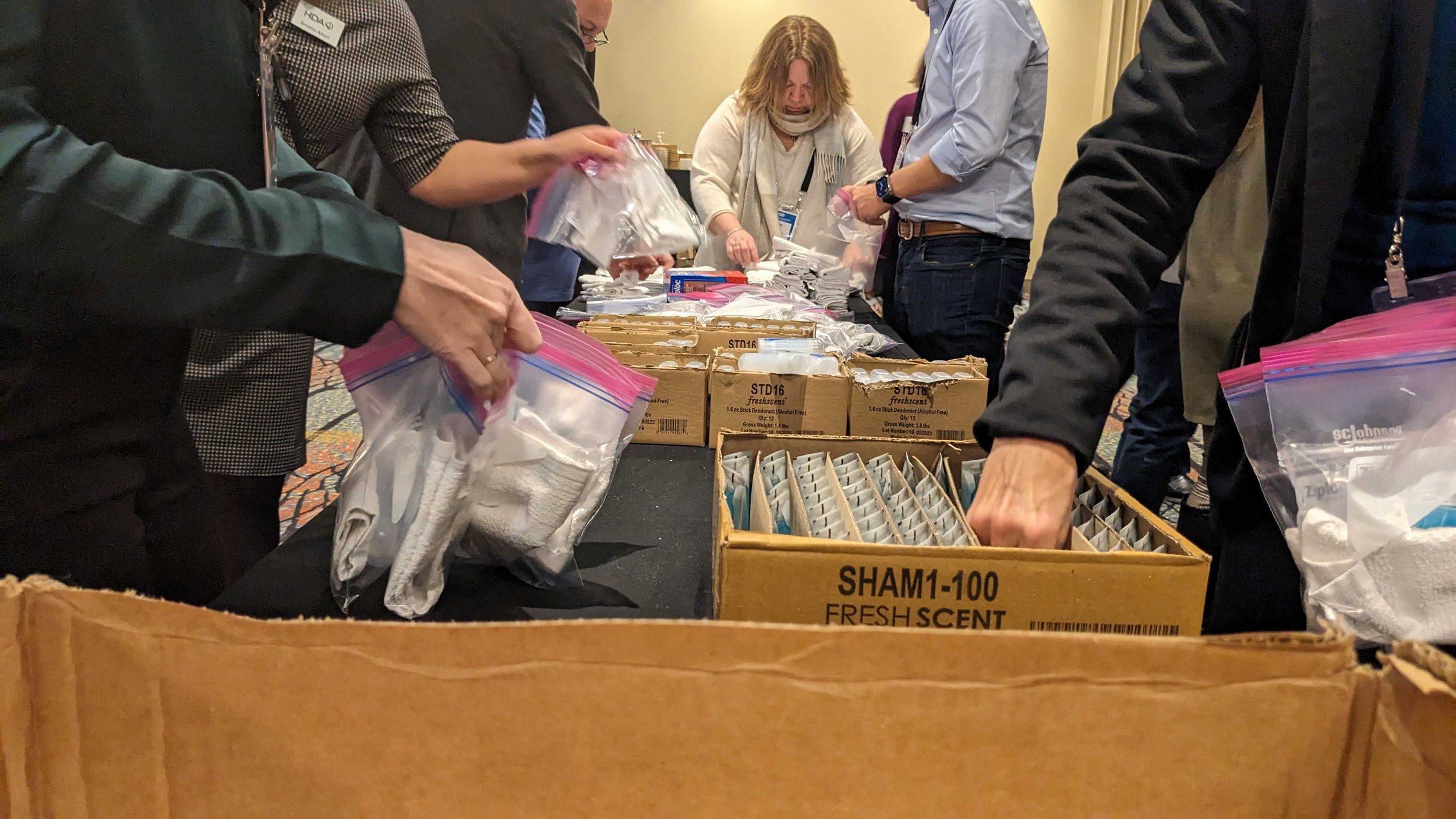  Volunteers assemble hygiene kits on March 14, 2023, during the Healthcare Distribution Alliance conference at the JW Marriott in downtown Indianapolis. The organization partnered with United Way of Central Indiana to offer the service project during