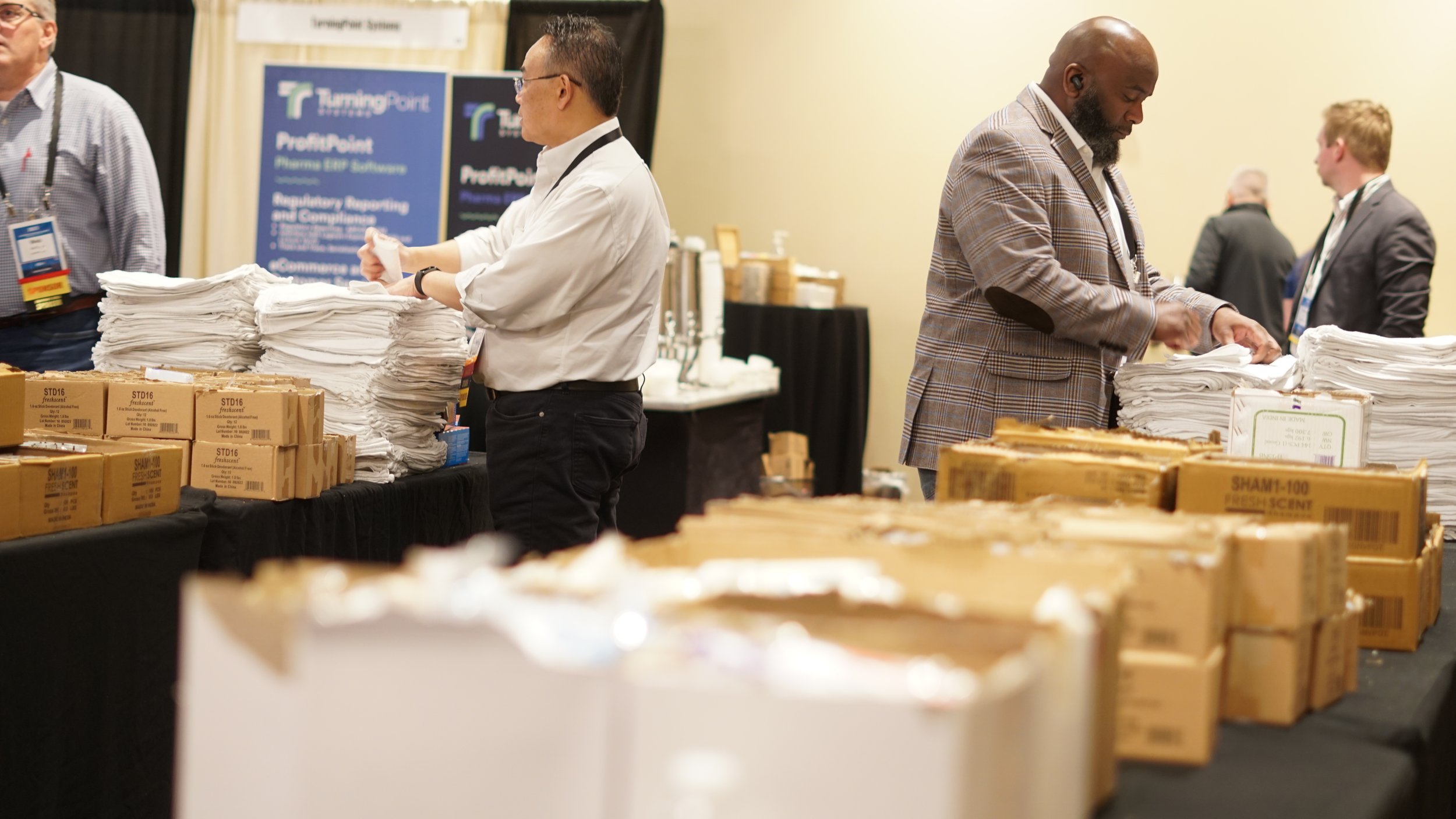  Volunteers assemble hygiene kits on March 14, 2023, during the Healthcare Distribution Alliance conference at the JW Marriott in downtown Indianapolis. The organization partnered with United Way of Central Indiana to offer the service project during