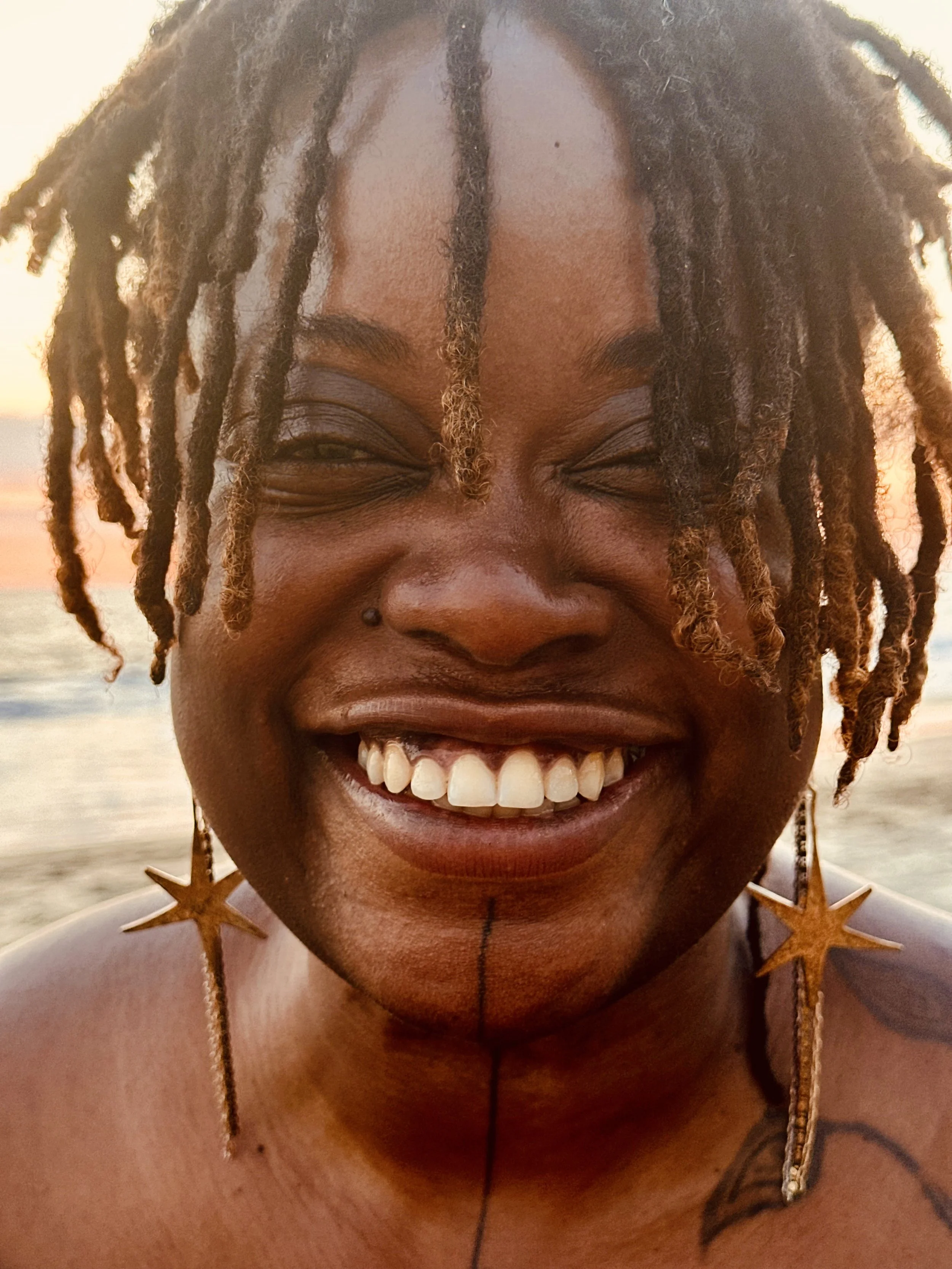 star earrings on jag.jpeg