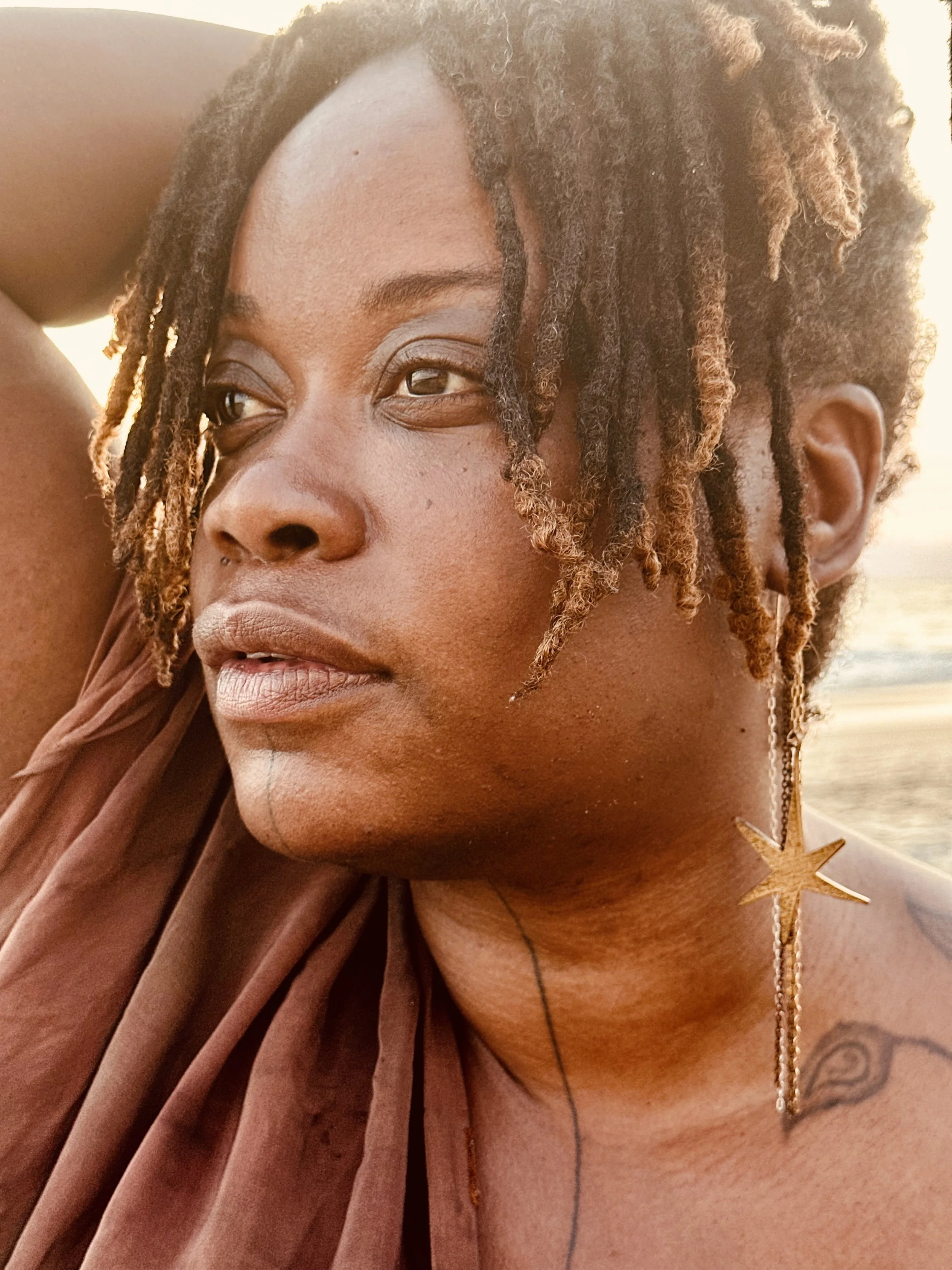 star earrings on jag 2.jpeg